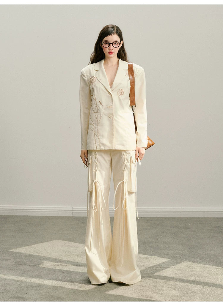 Ensemble veste ajourée et jupe courte à broderie rose