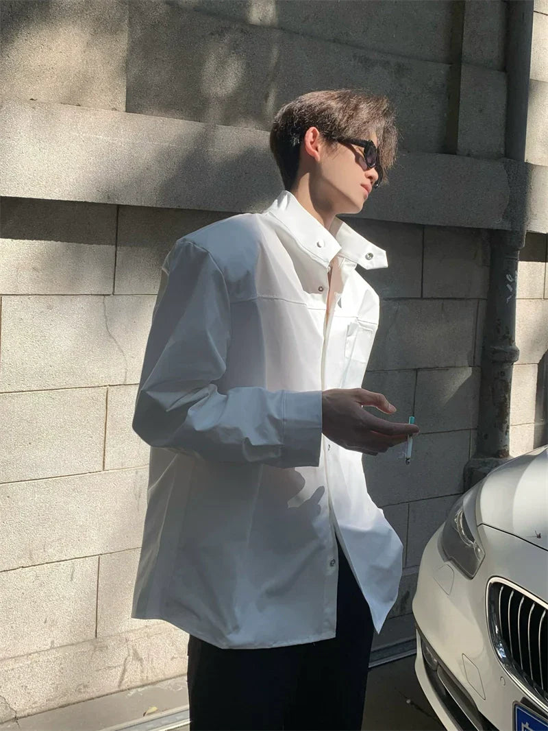어깨 패드가 있는 스탠드 칼라 긴팔 셔츠