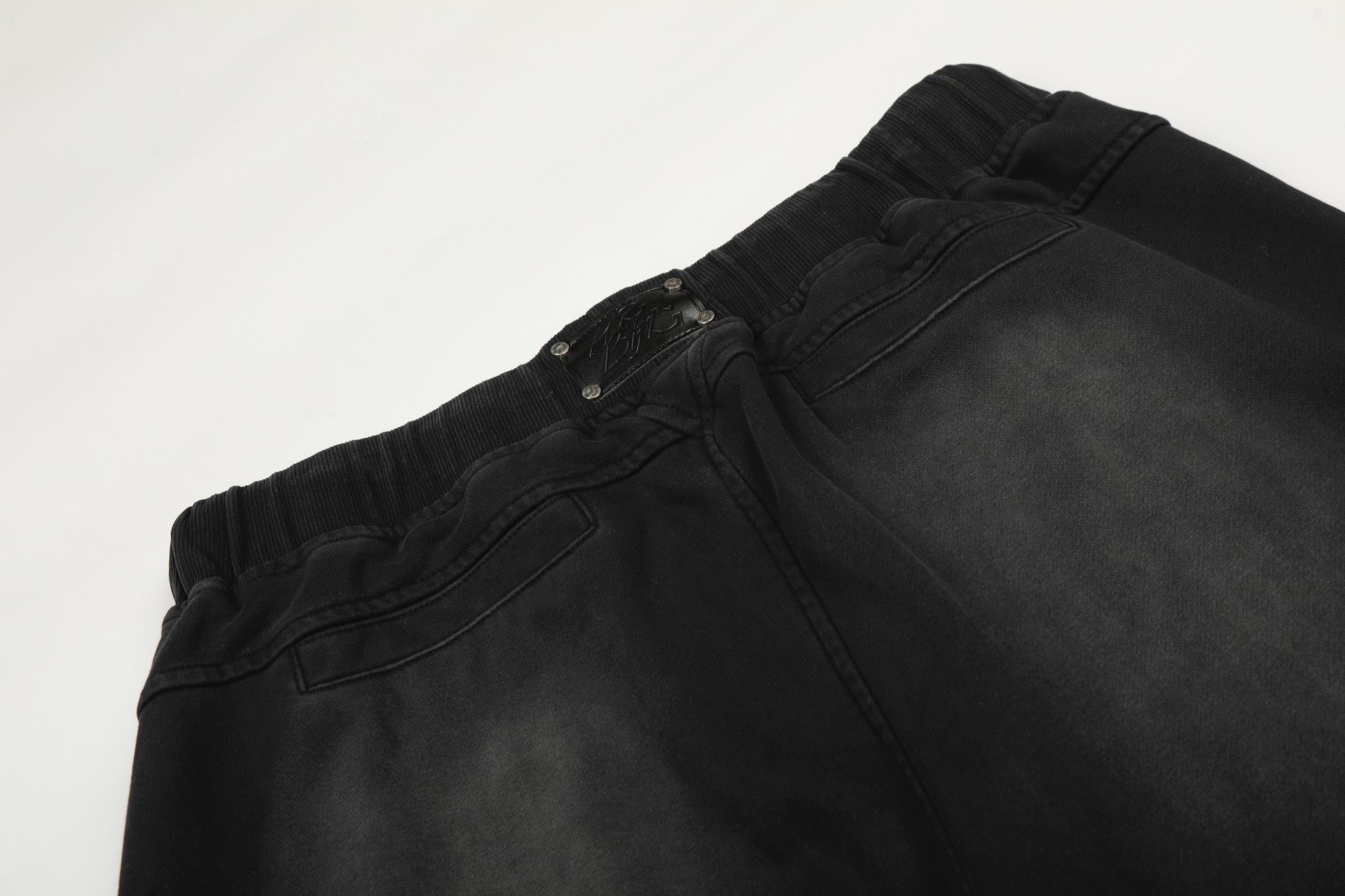 Deconstruction Washed Dirty Curved Sweatpants