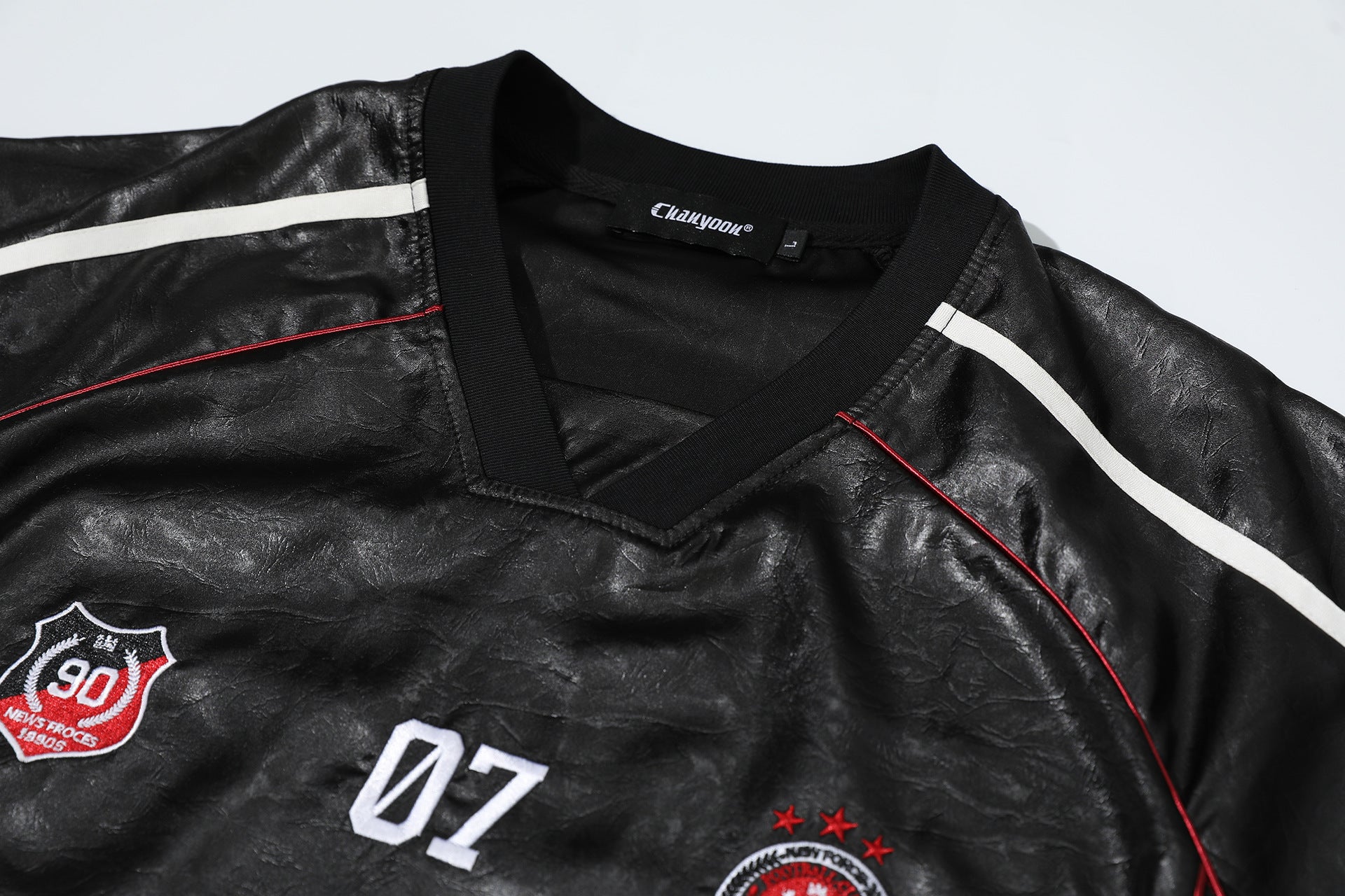 Chest Emblem PU Leather Stitching V-Neck Oversize Short Sleeve T-Shirt