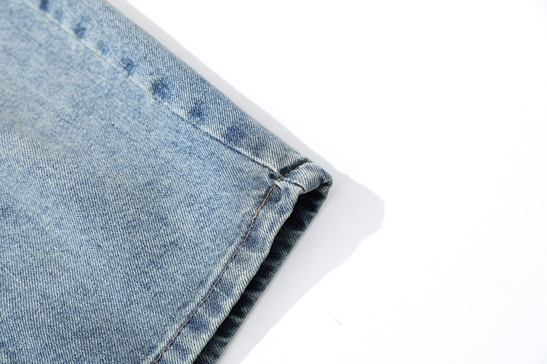 Washed Whisker Curved Cropped Denim Jeans