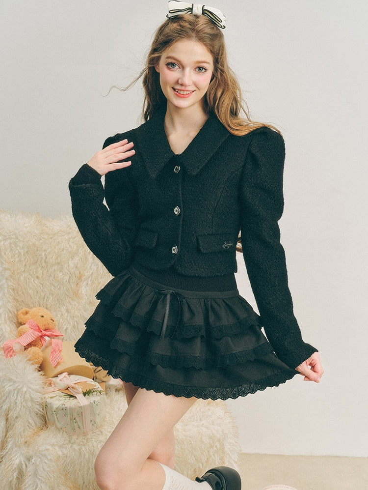 Chaqueta de lana con mangas abullonadas cortas y lazo