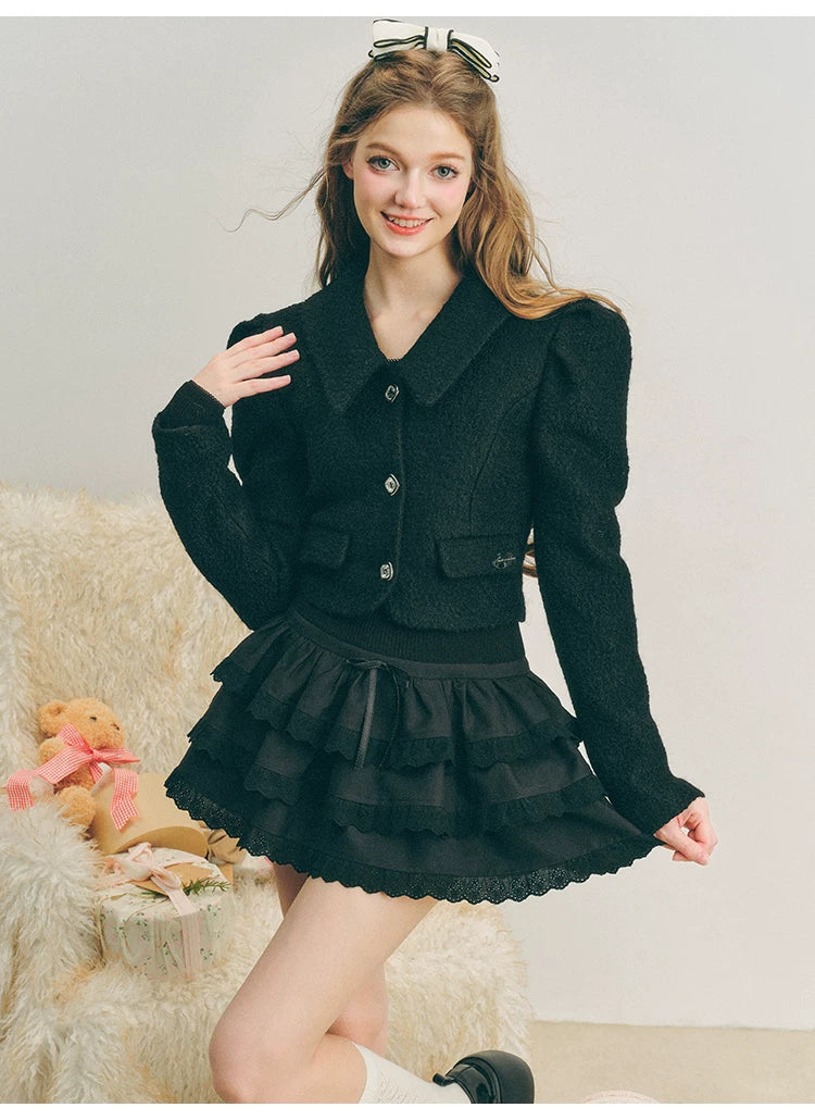 Chaqueta de lana con mangas abullonadas cortas y lazo