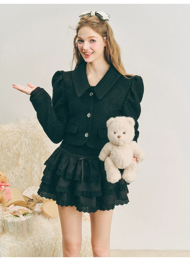 Chaqueta de lana con mangas abullonadas cortas y lazo