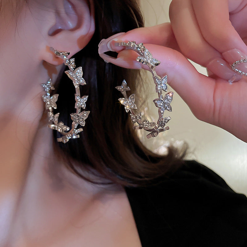 Silver needle butterfly splicing round diamond earrings Korean exaggerated design earrings sweet personality temperament earrings female