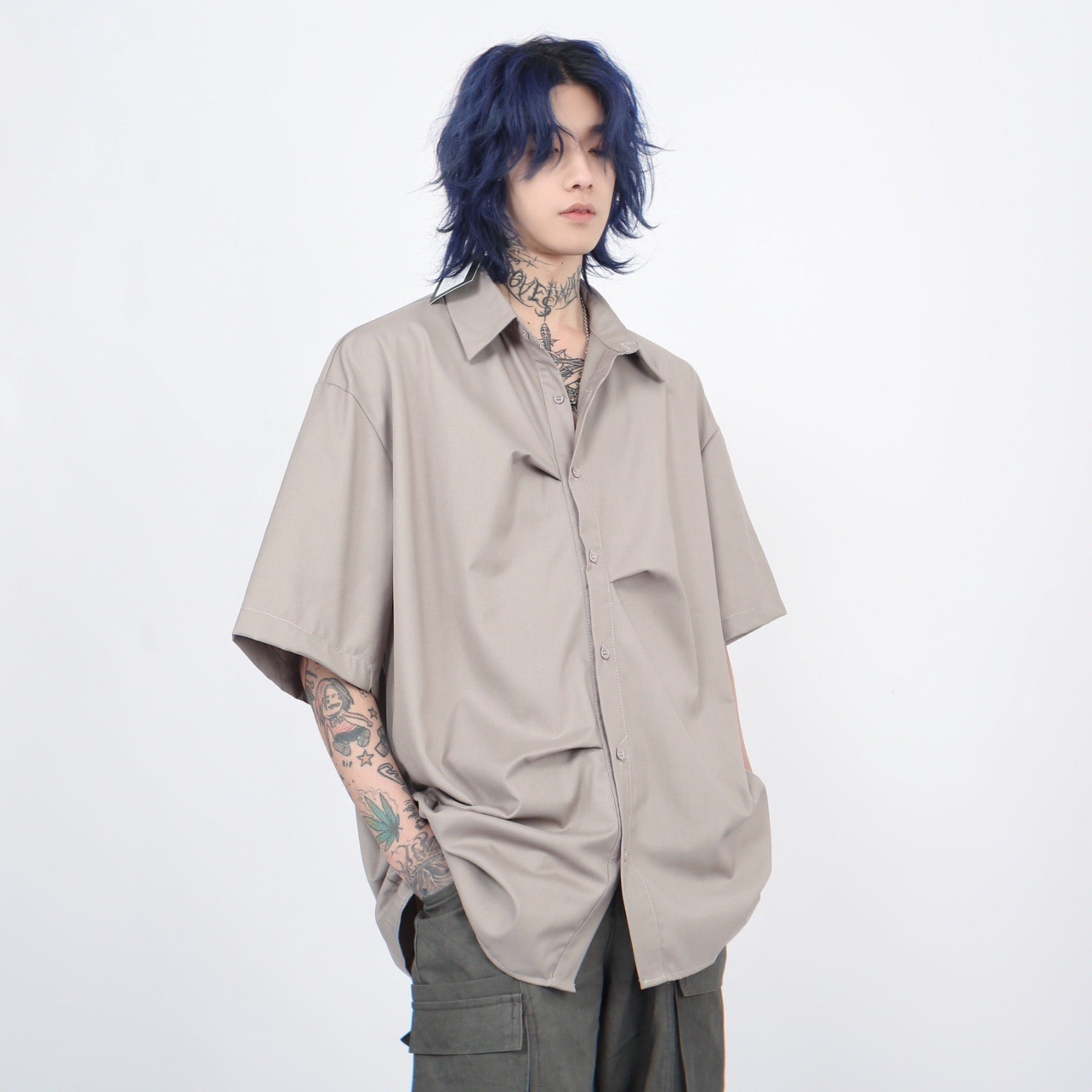 Camicia oversize a maniche corte con pieghe