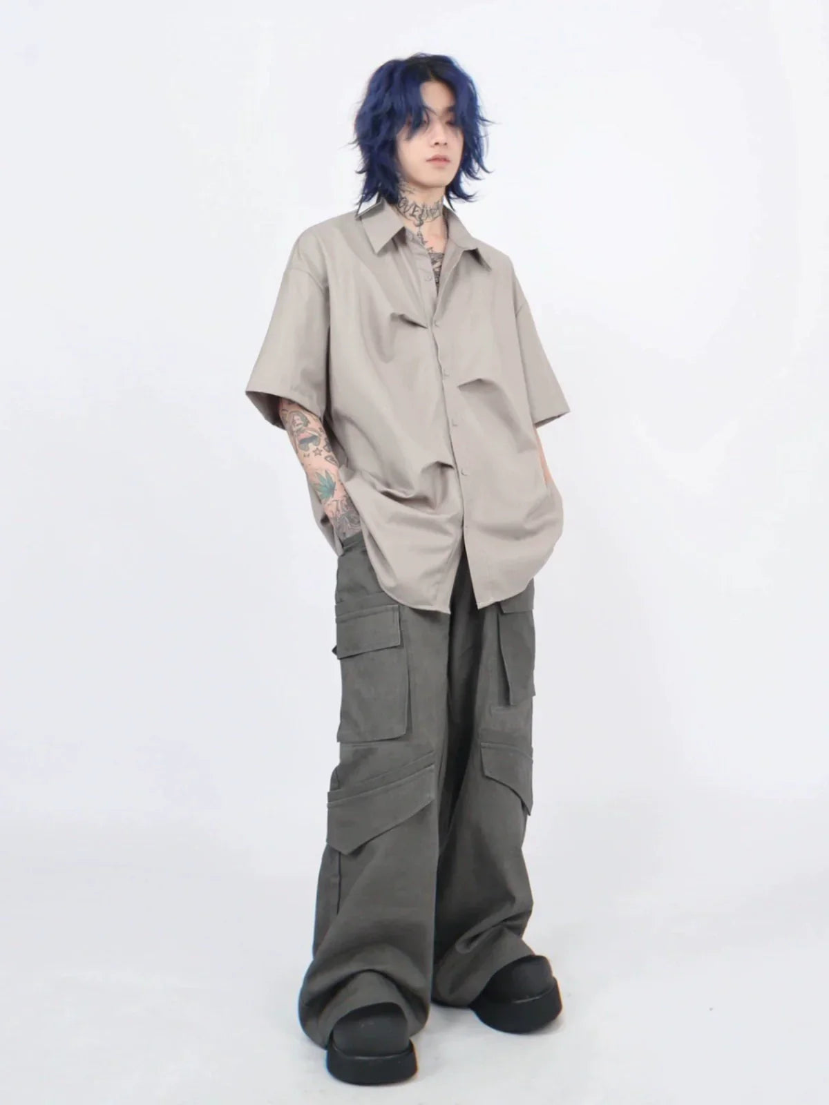 Camicia oversize a maniche corte con pieghe