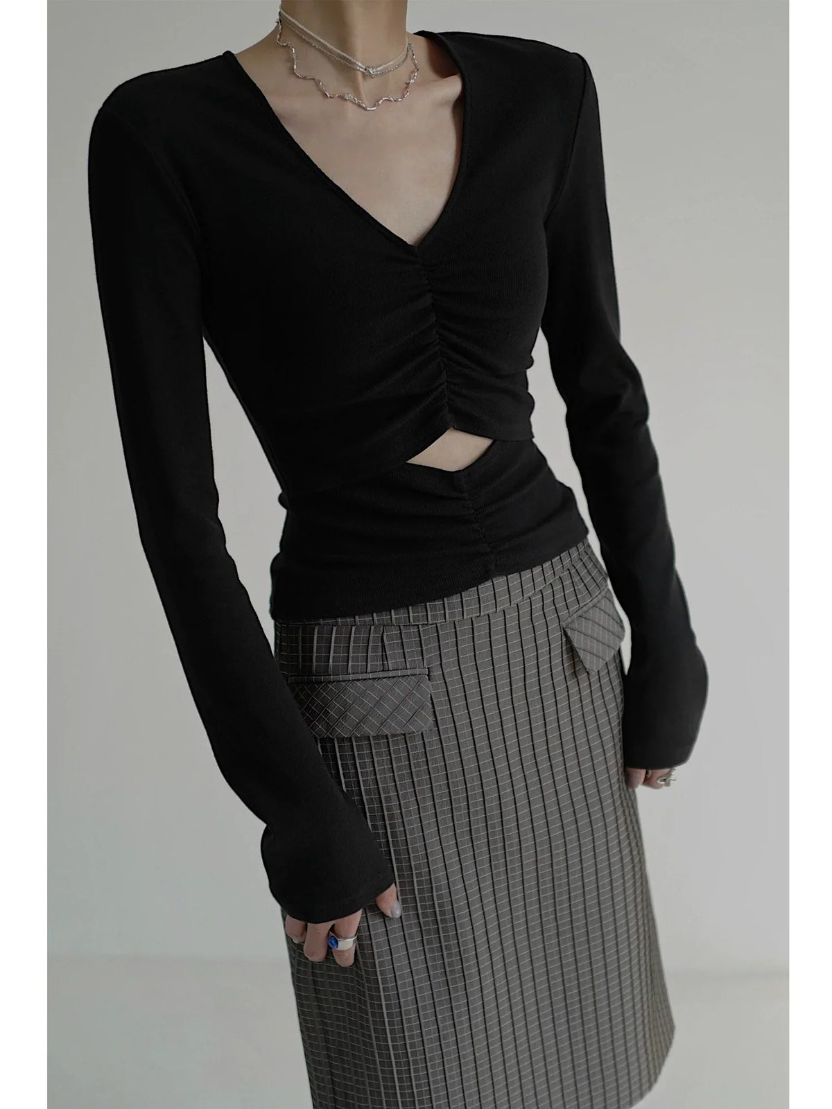 Top de manga larga con doble pliegue