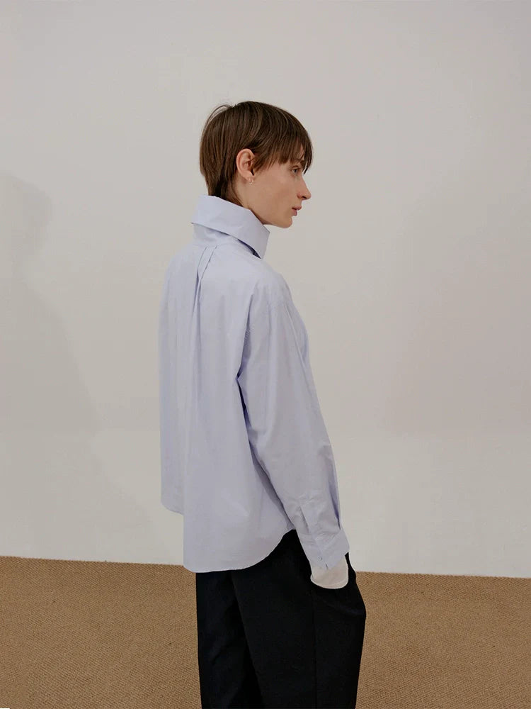 Camicia a maniche lunghe con collo alto e risvolto