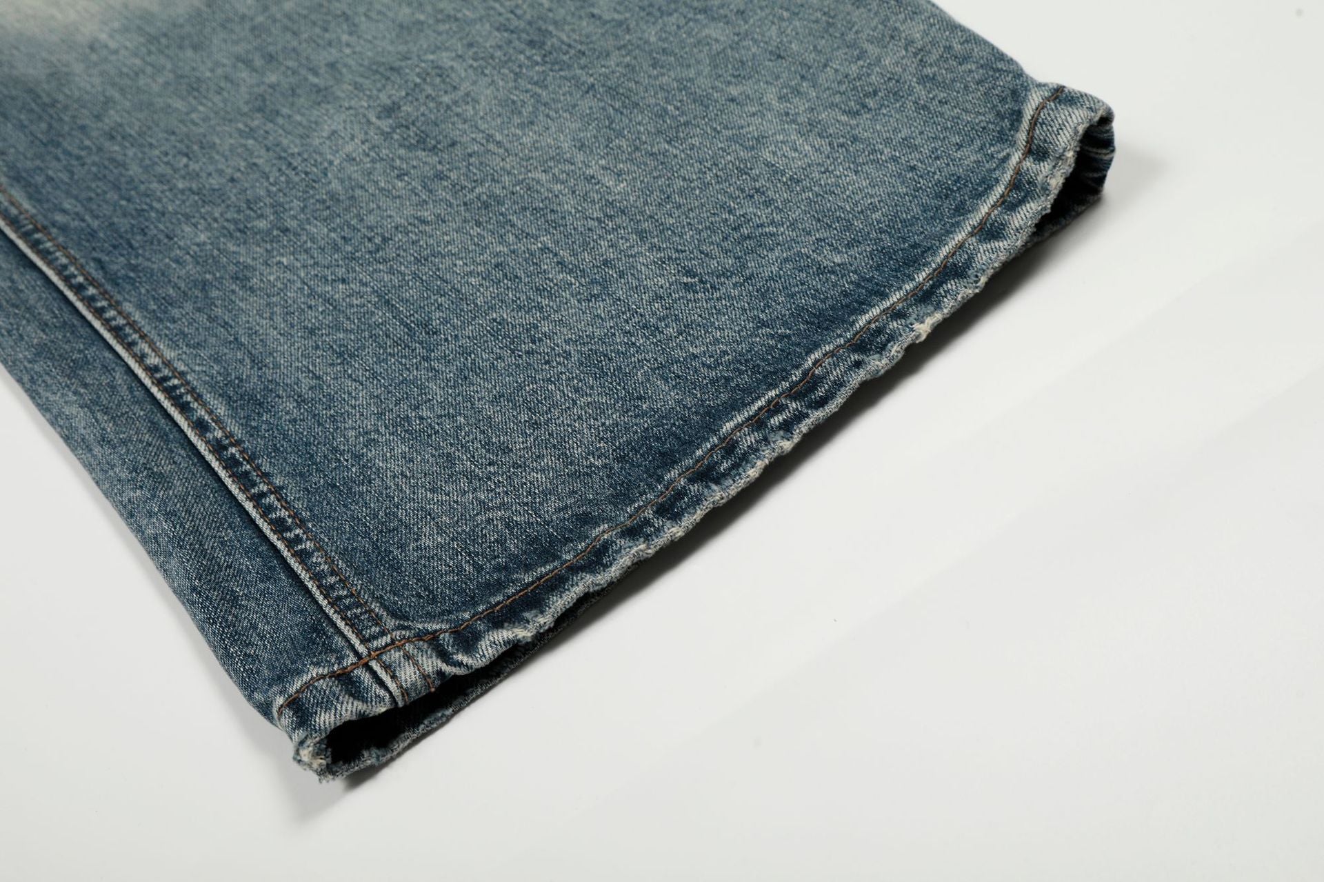 Washed Whisker Damage Curved Denim Jeans