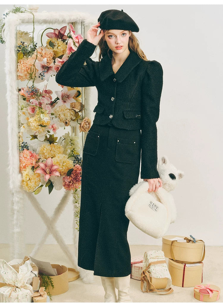 Chaqueta de lana con mangas abullonadas cortas y lazo