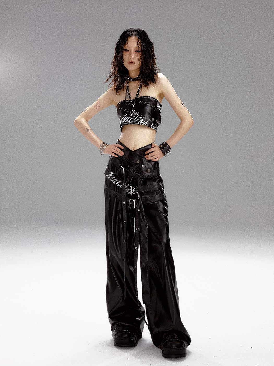High-Waist V-Cut Graffiti Print Belted Black PU Leather Pants