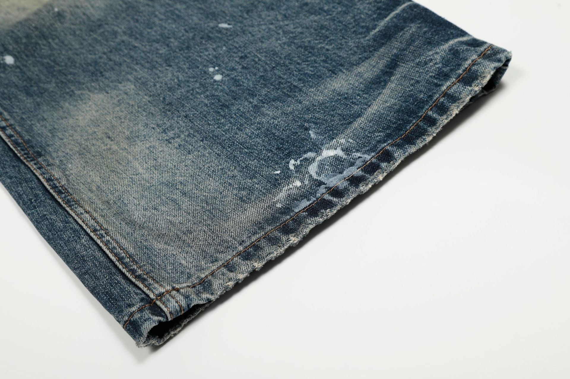 Washed Whisker Paint Splatter Curved Denim Jeans