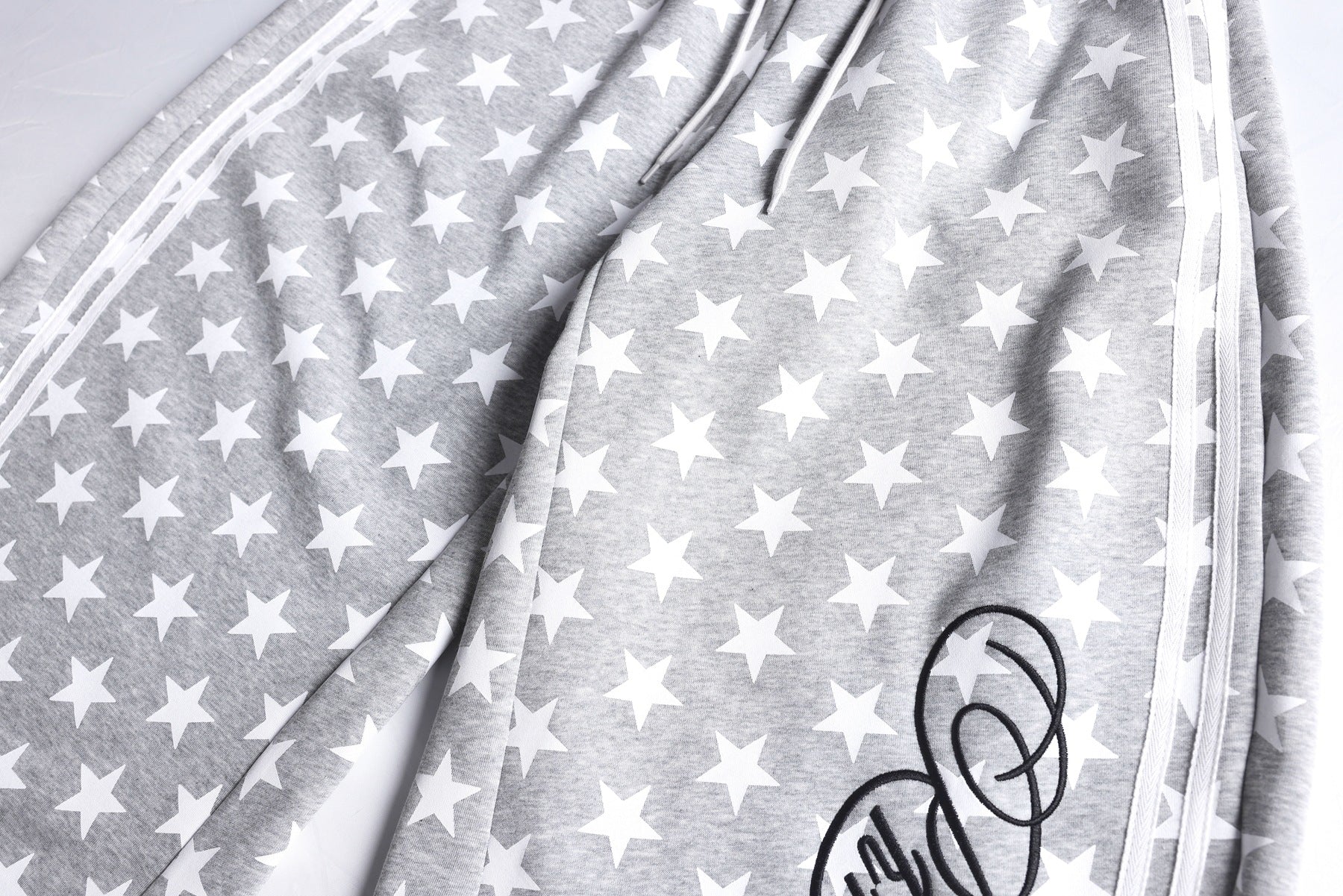 All-Over Print Deconstruction Wide Leg Curved Sweatpants