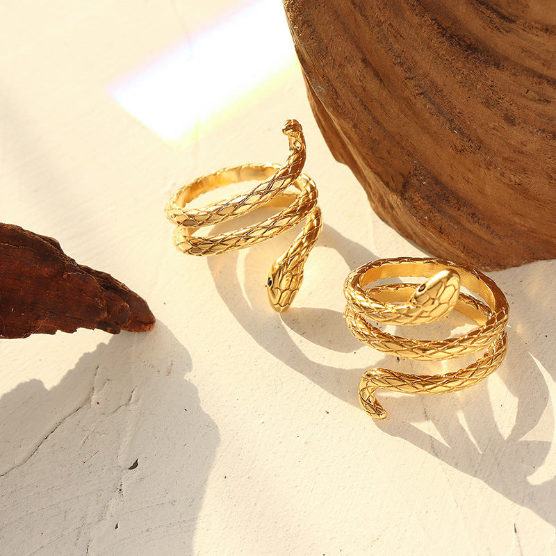 Gold Tone Snake Design Ring, Unique Coiled Serpent Jewelry, Fashionable Women's Accessory, Trendy Animal-Inspired Ring, Popular Choice for Statement Pieces, Best Seller in Novelty Jewelry.