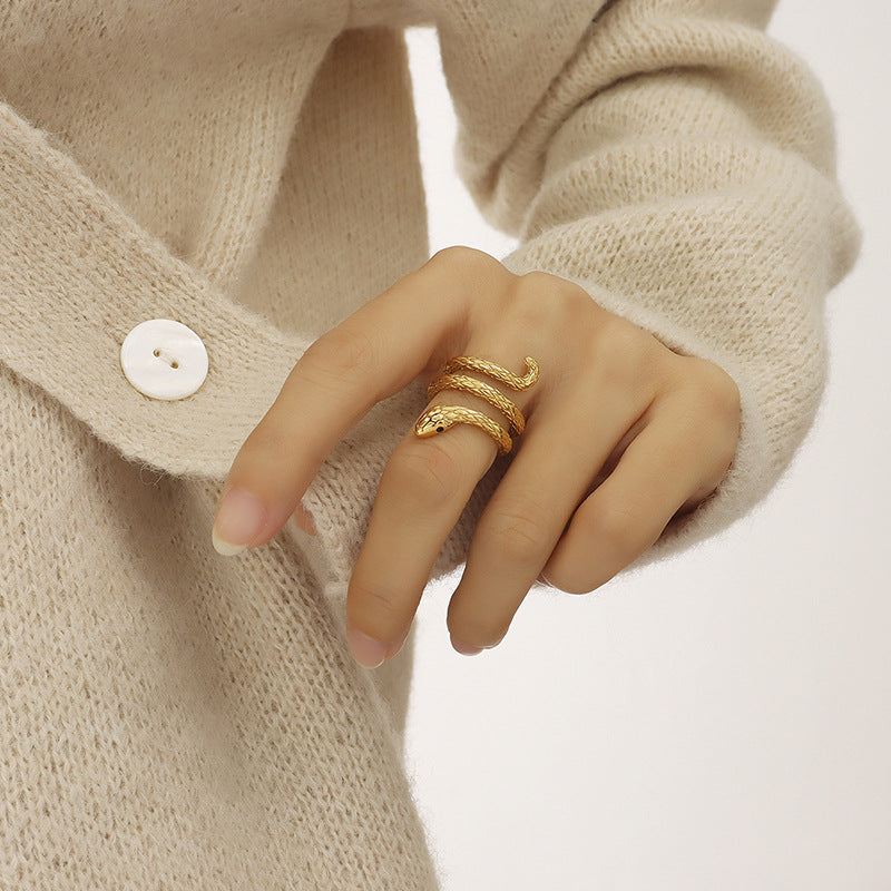 Gold Tone Snake Design Ring, Unique Coiled Serpent Jewelry, Fashionable Women's Accessory, Trendy Animal-Inspired Ring, Popular Choice for Statement Pieces, Best Seller in Novelty Jewelry.