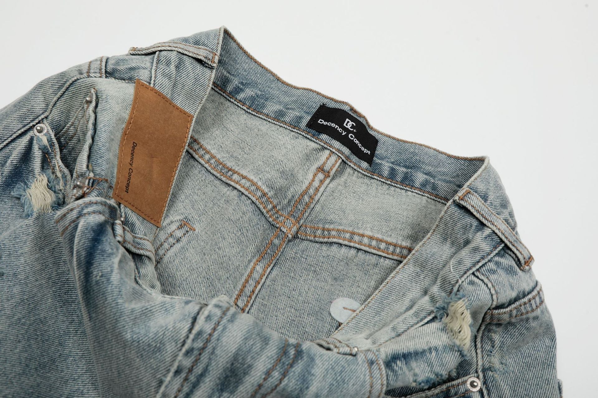 Wash Damage Wide Leg Curved Denim Jeans