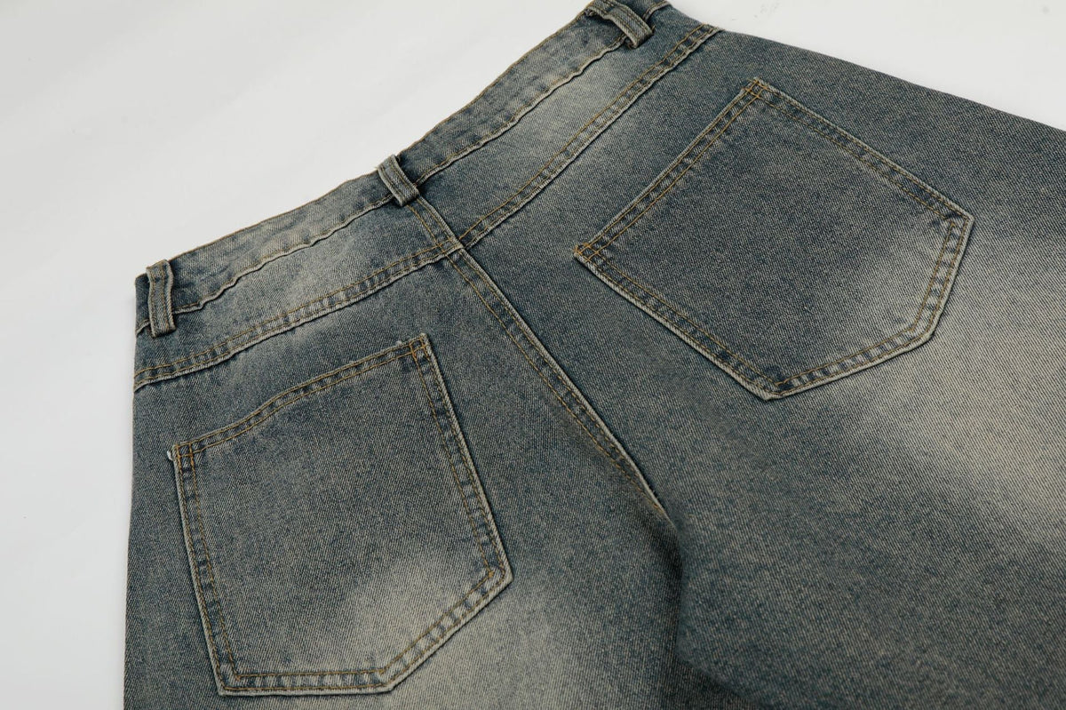 Washed Whisker Cross Studs Wide Leg Denim Jeans