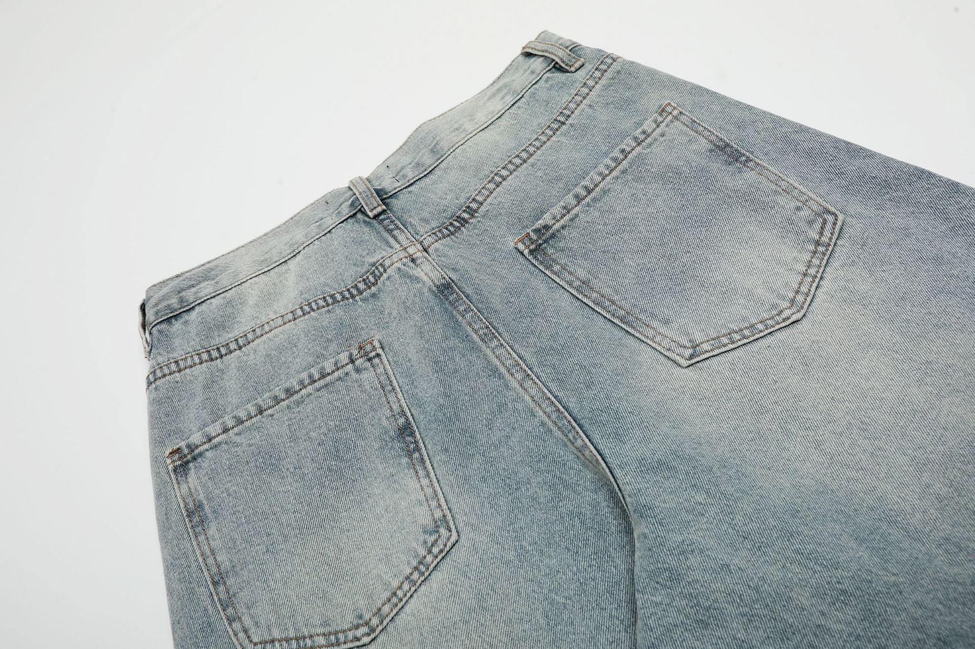 Wash Damage Wide Leg Curved Denim Jeans