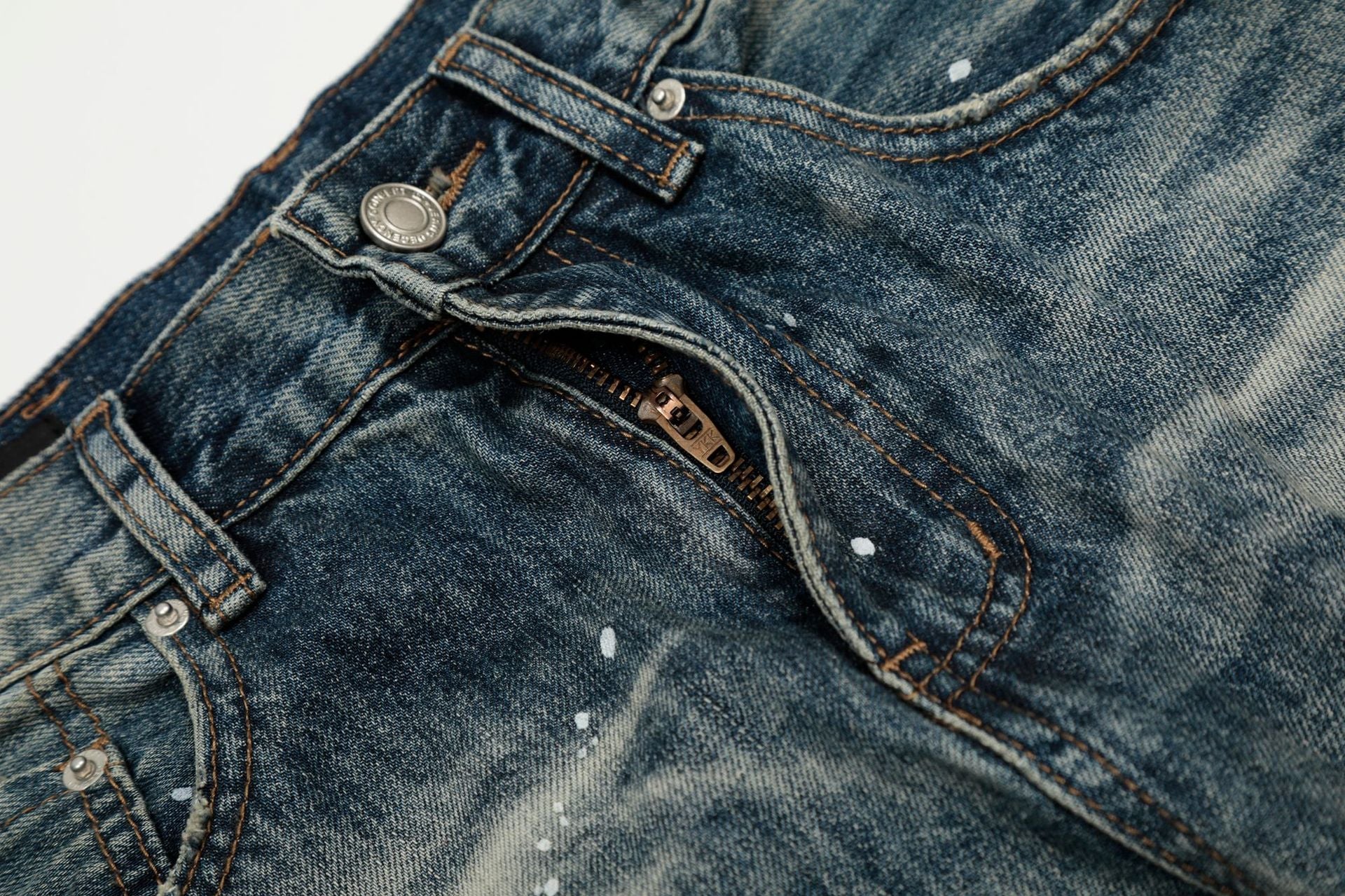 Washed Whisker Paint Splatter Curved Denim Jeans