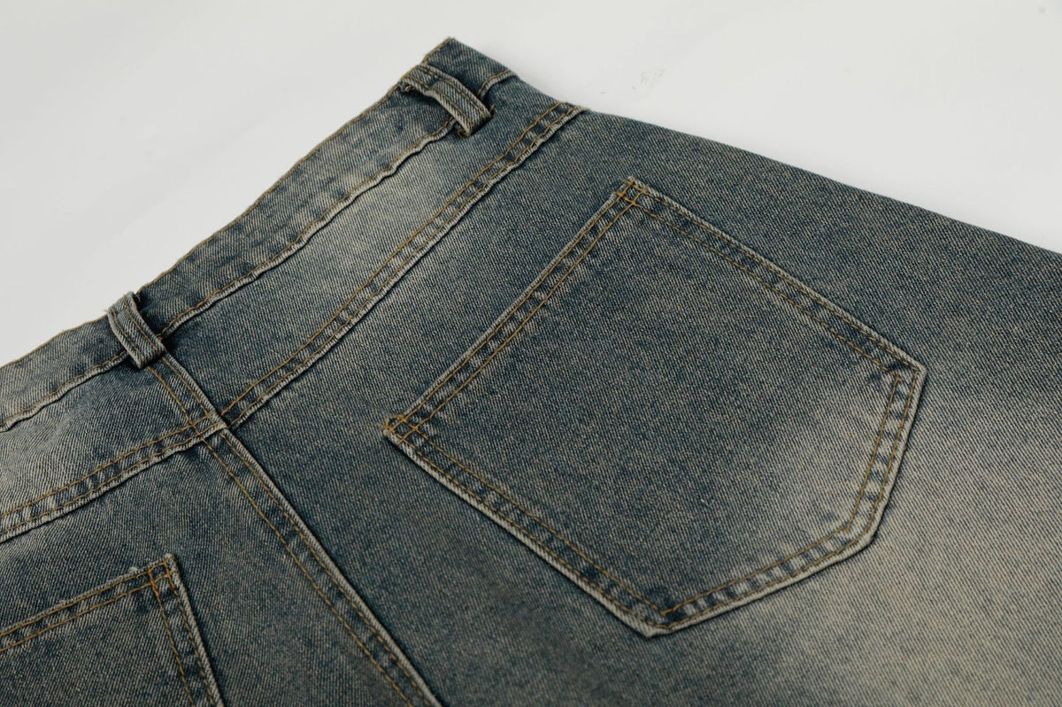 Washed Whisker Cross Studs Wide Leg Denim Jeans