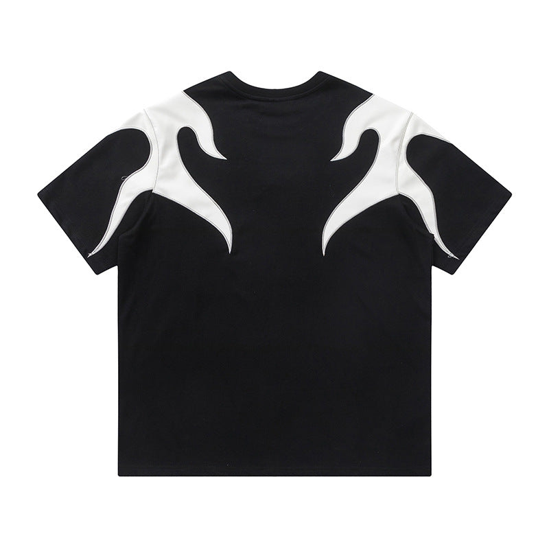 Camiseta suelta con llama blanca bordada