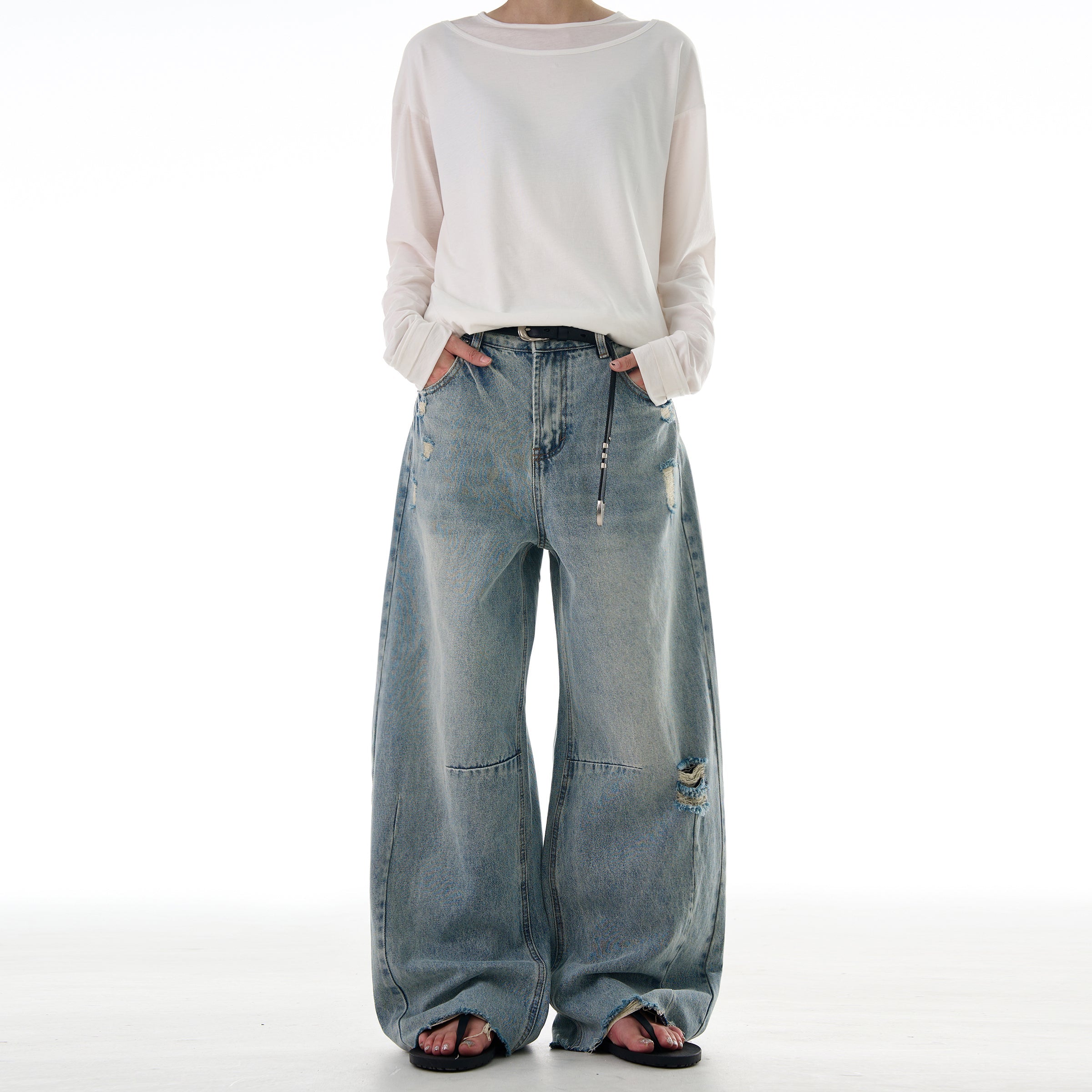 Distressed Scimitar Denim Jeans