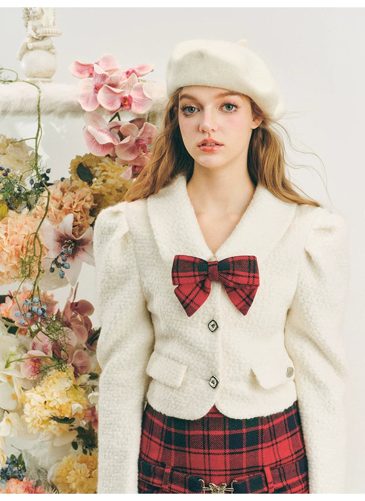 Chaqueta de lana con mangas abullonadas cortas y lazo