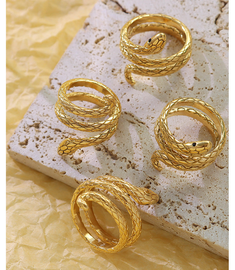 Gold Tone Snake Design Ring, Unique Coiled Serpent Jewelry, Fashionable Women's Accessory, Trendy Animal-Inspired Ring, Popular Choice for Statement Pieces, Best Seller in Novelty Jewelry.