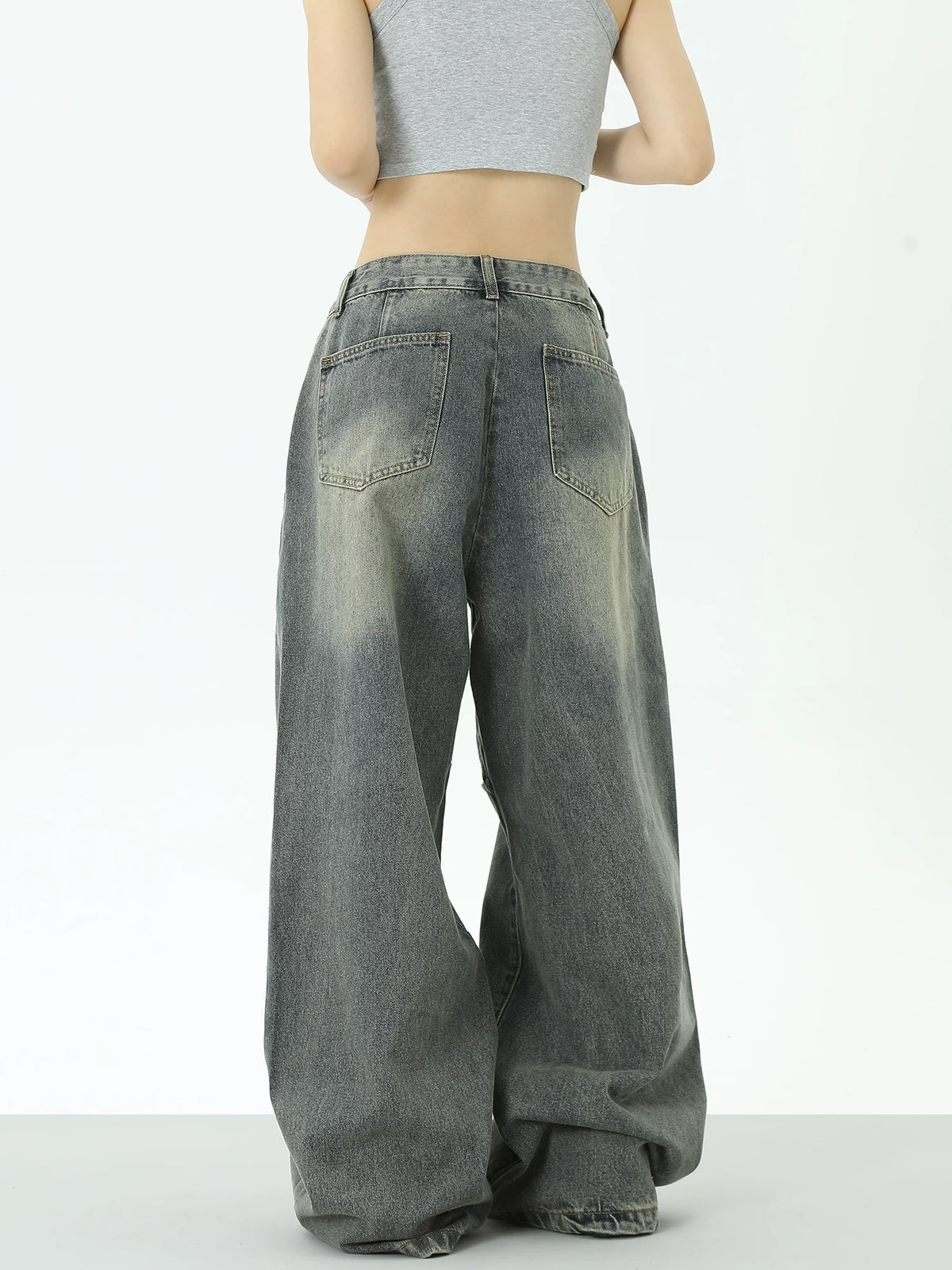 Jean en jean avec décoration à boutons métalliques et design ajouré