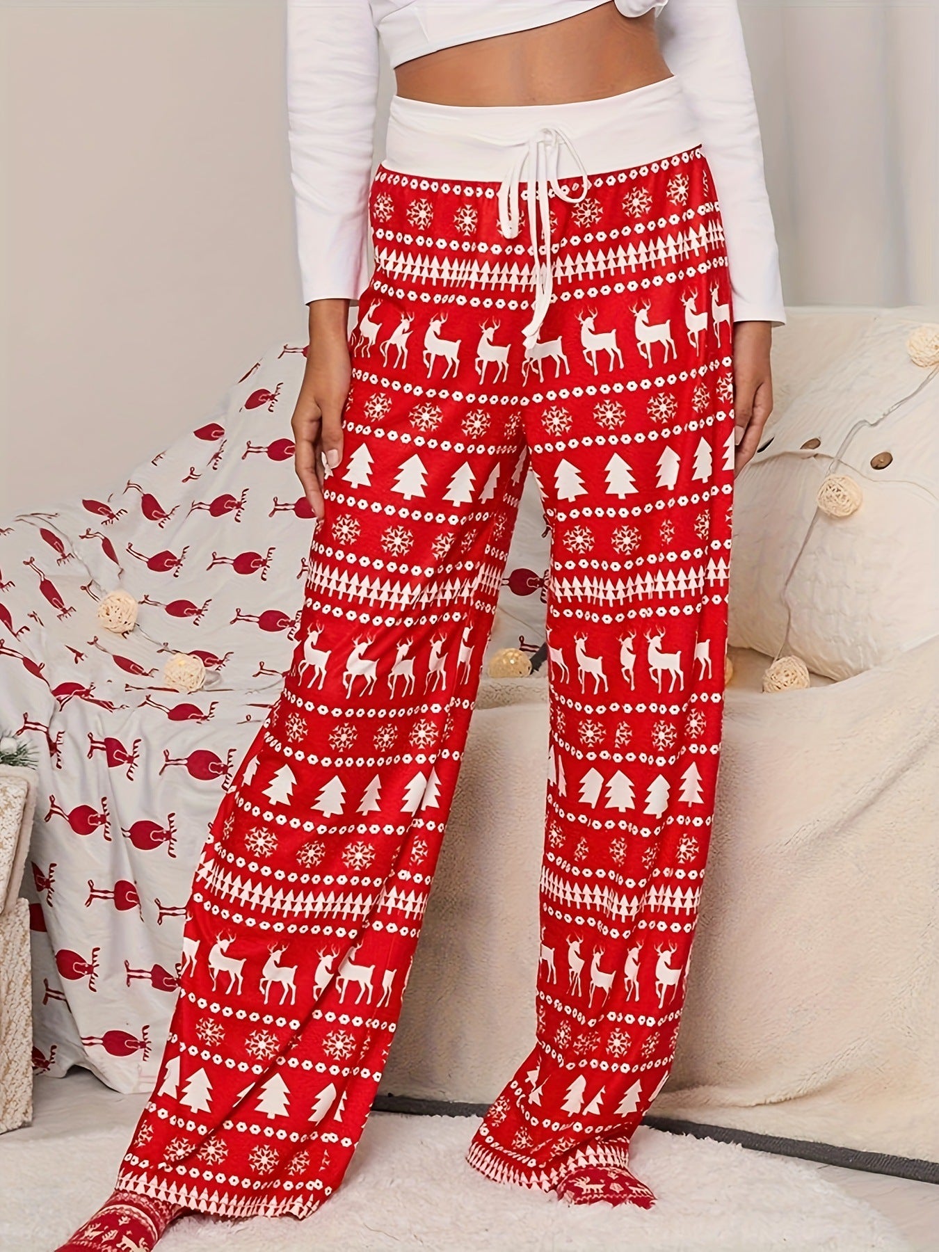 pantaloni rossi con stampa di albero di Natale