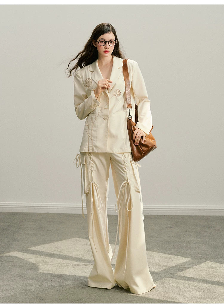 Ensemble veste ajourée et jupe courte à broderie rose