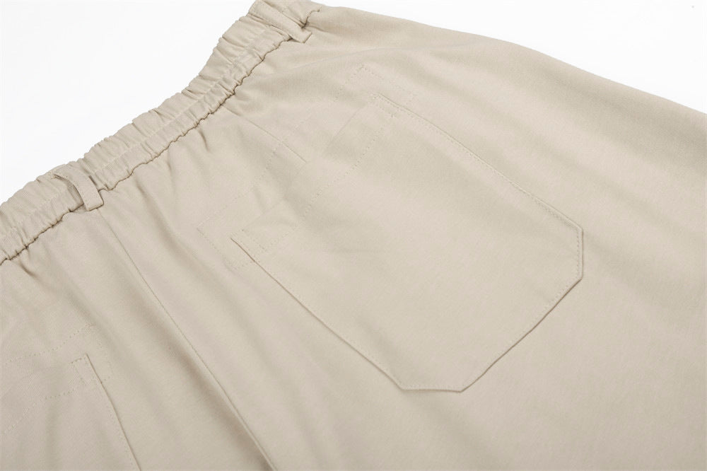 DAXUEN Loose-fitting wide-leg trousers in black and light beige