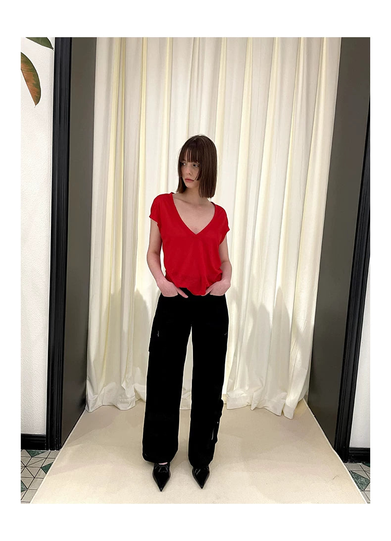 Pantalones cargo irregulares con múltiples bolsillos