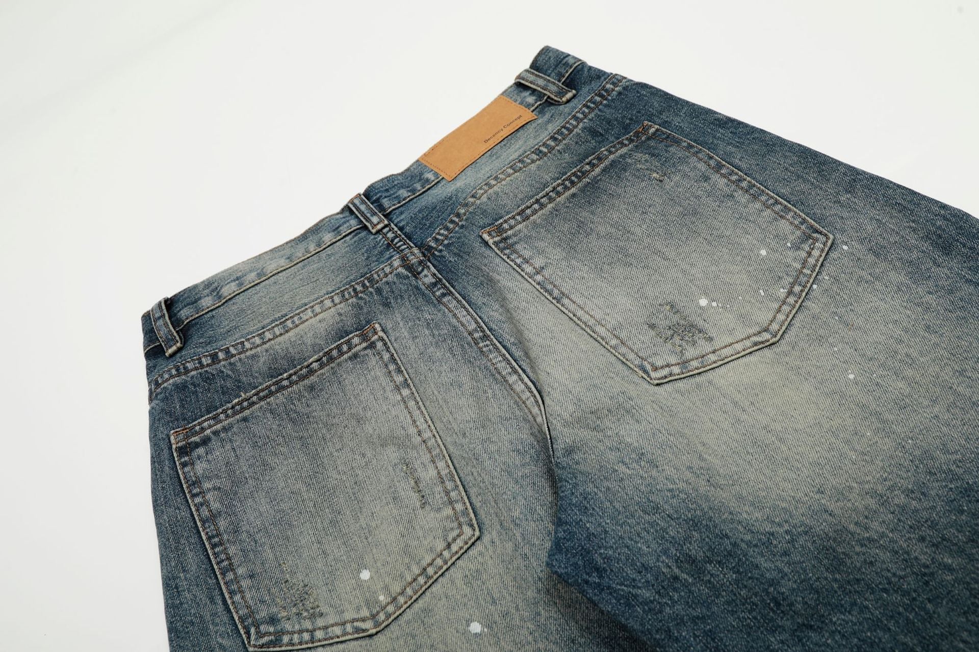 Washed Whisker Paint Splatter Curved Denim Jeans
