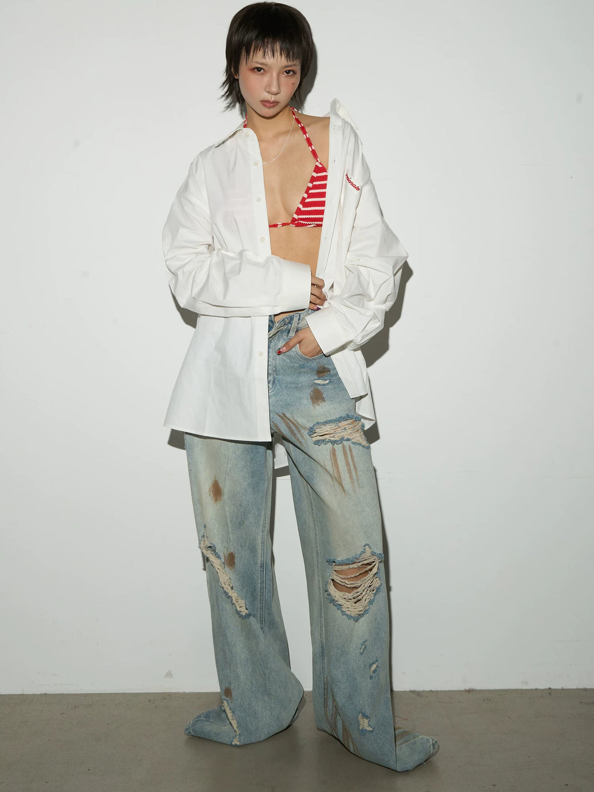 Rust Fade Damage Wash Draped Wide Leg Denim Jeans