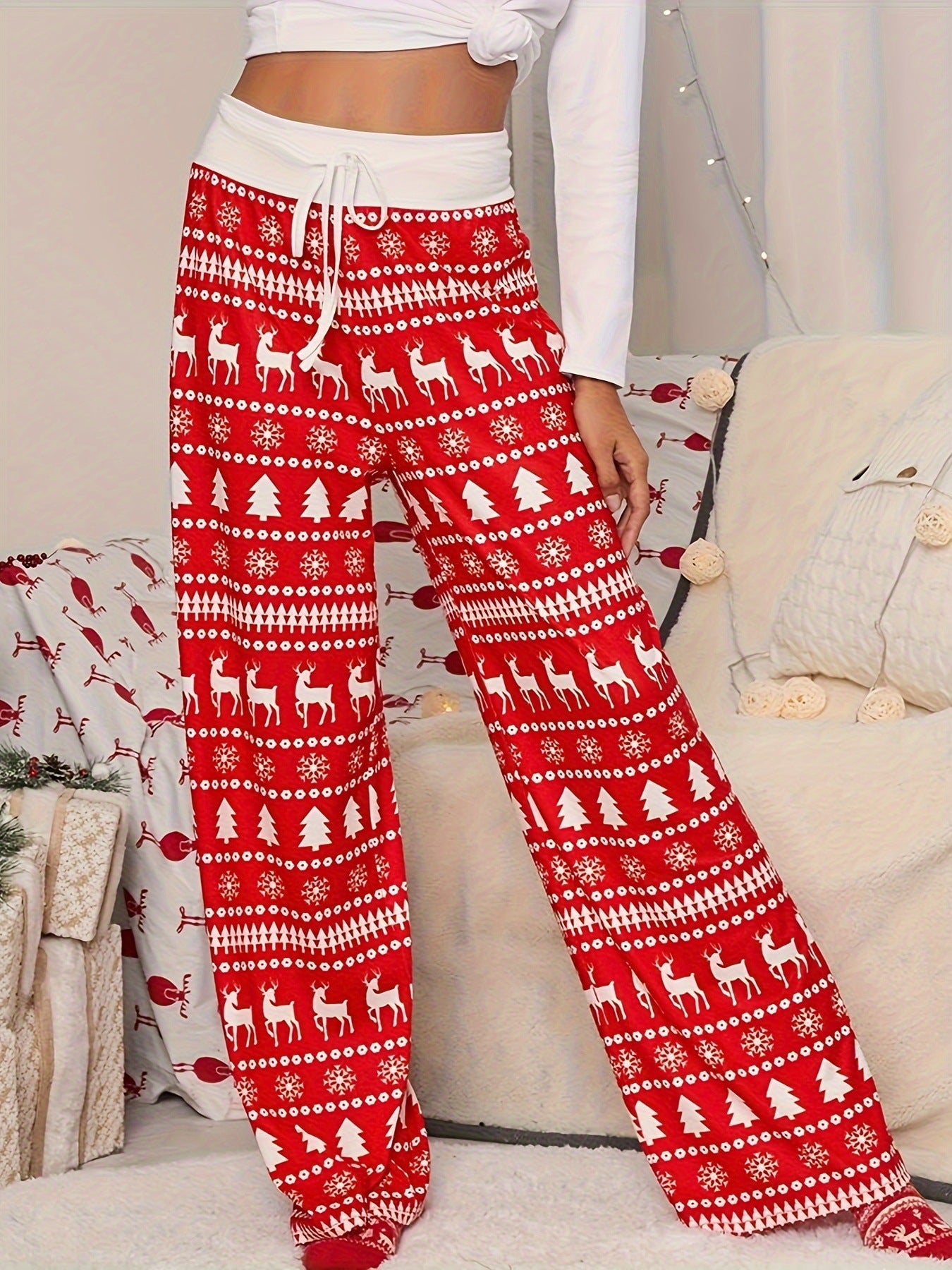pantaloni rossi con stampa di albero di Natale