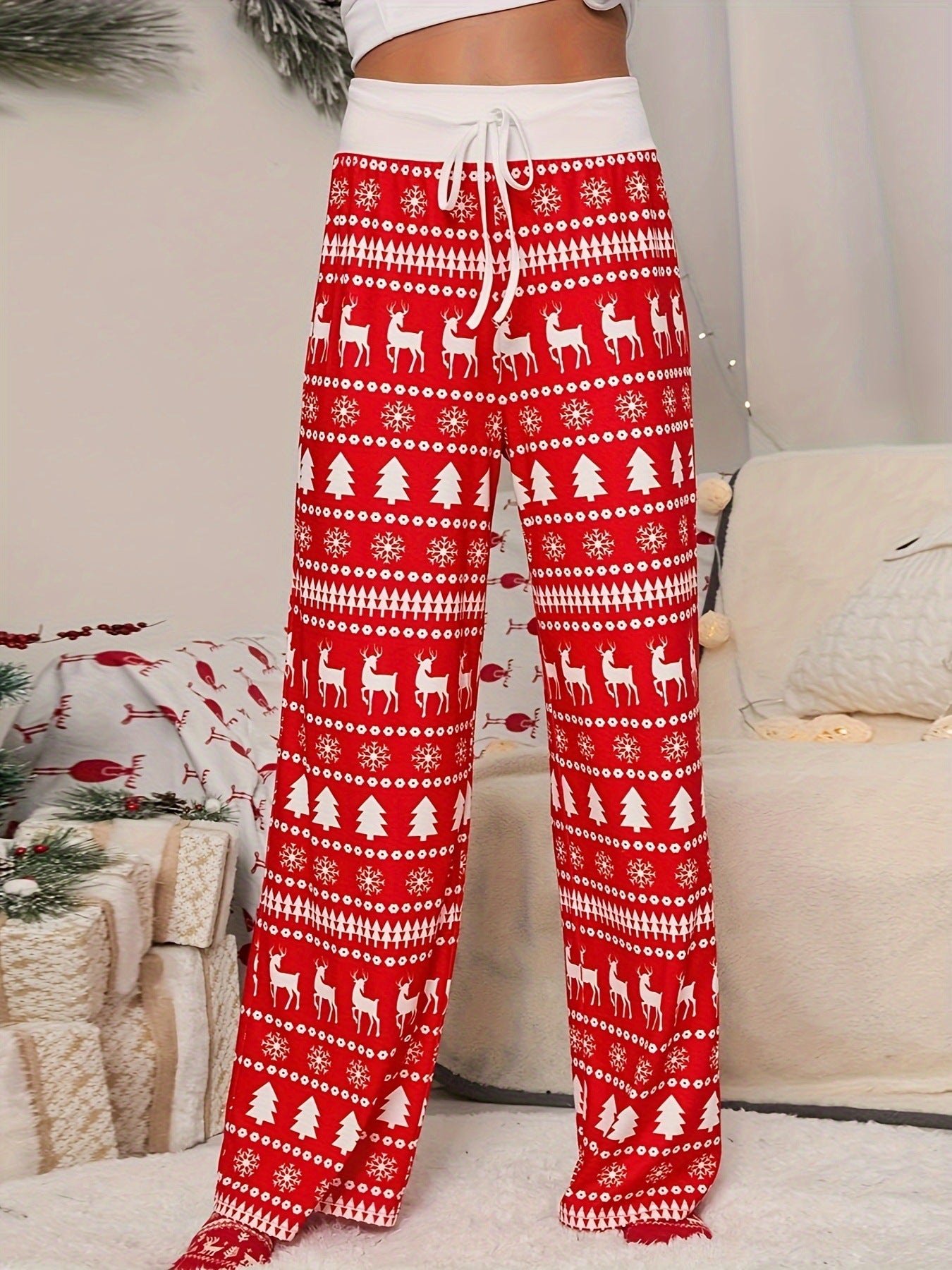 pantaloni rossi con stampa di albero di Natale