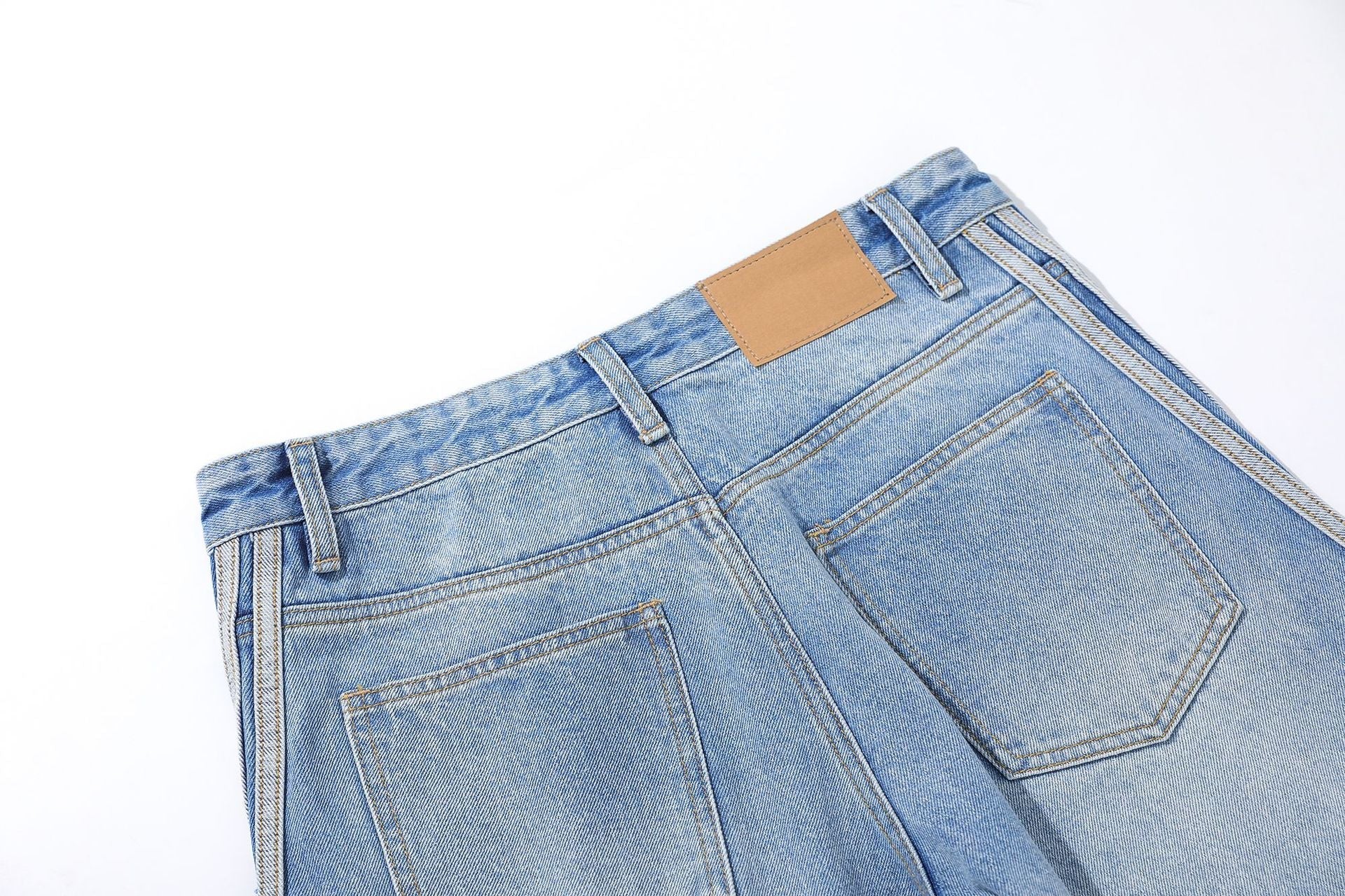 Washed Whisker Pin Tuck Wide Leg Denim Jeans