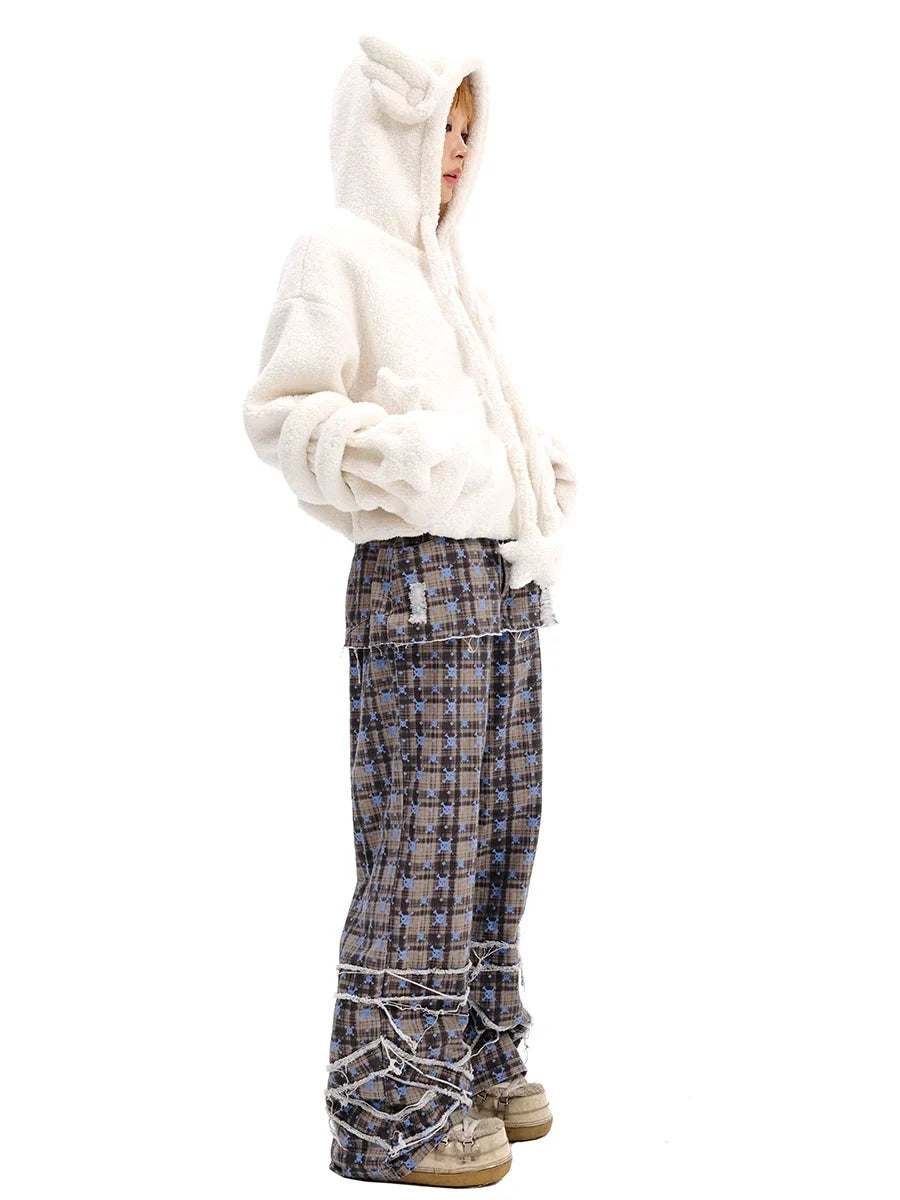 Pantalones tipo falda cruzada con estampado de calaveras y cuadros