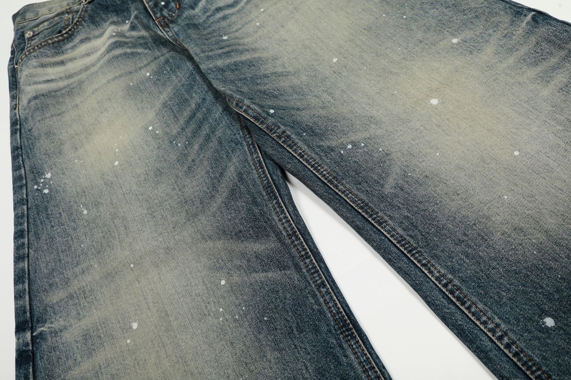 Washed Whisker Paint Splatter Curved Denim Jeans