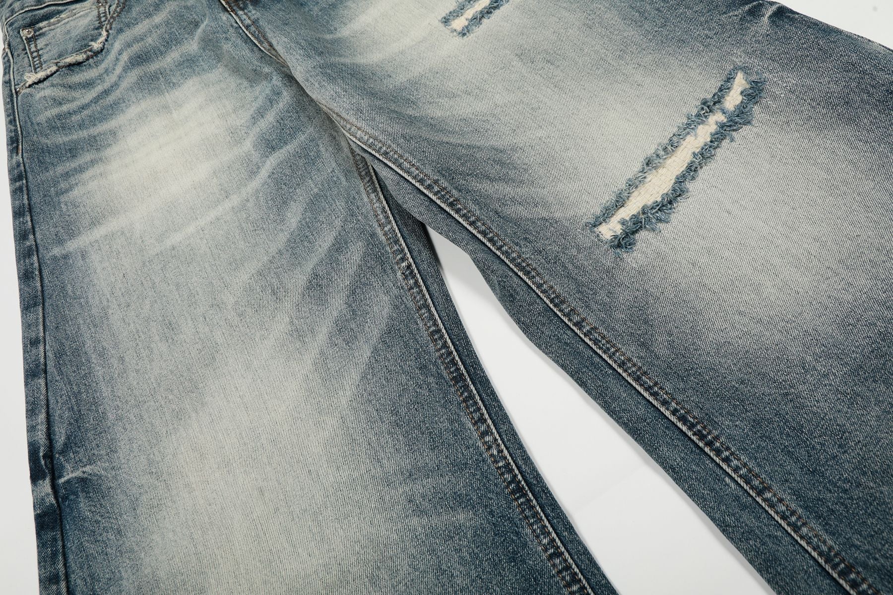 Washed Whisker Damage Curved Denim Jeans