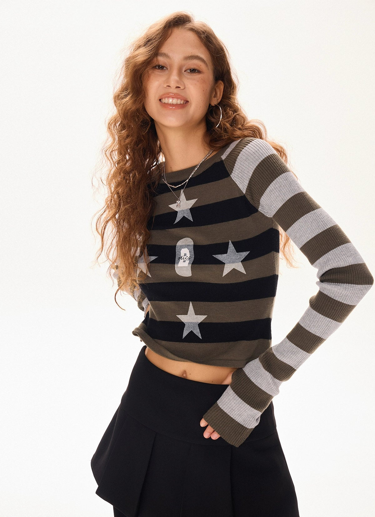 Pull court en maille rayée