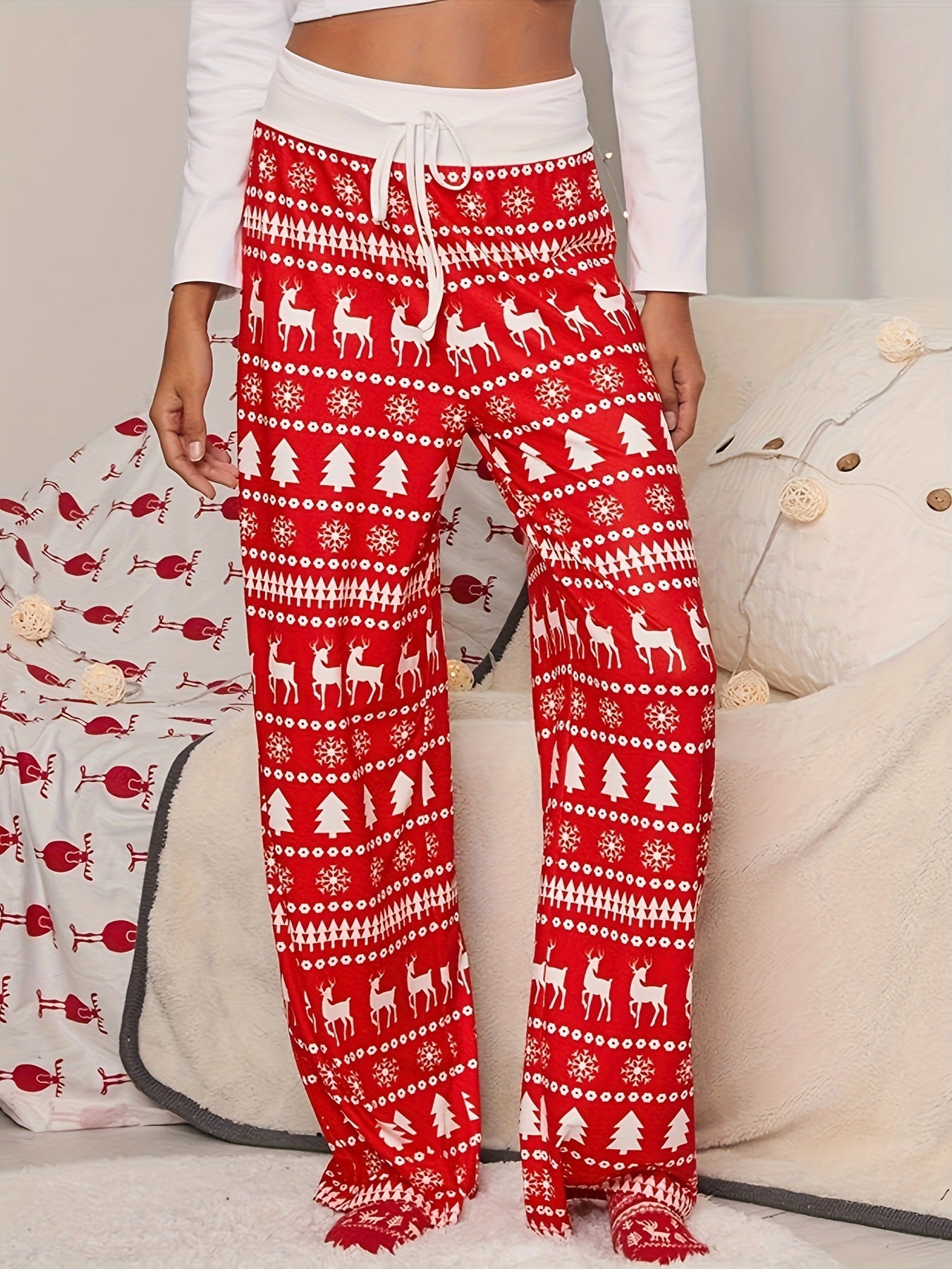 pantaloni rossi con stampa di albero di Natale