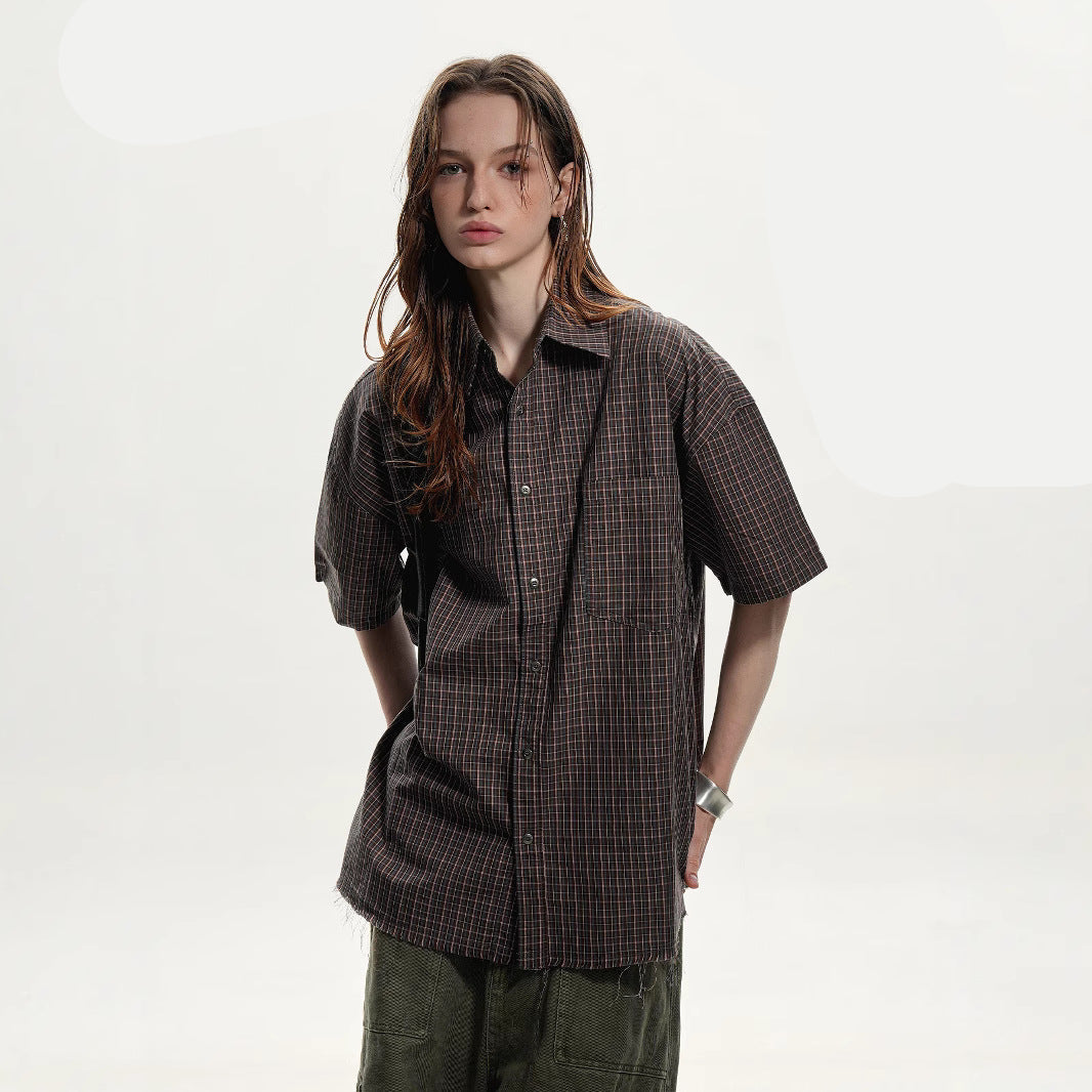 Person wearing a plaid shirt with text and icons on a white background
