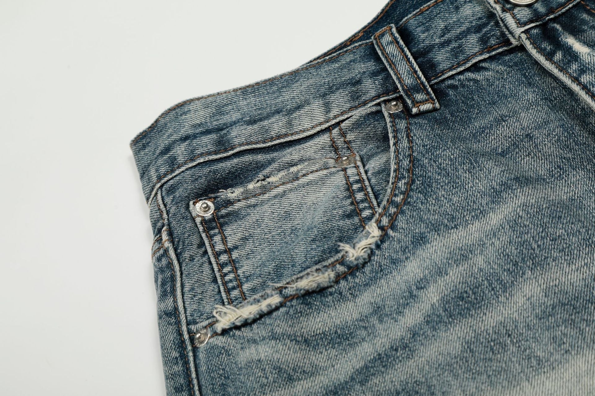 Washed Whisker Damage Curved Denim Jeans