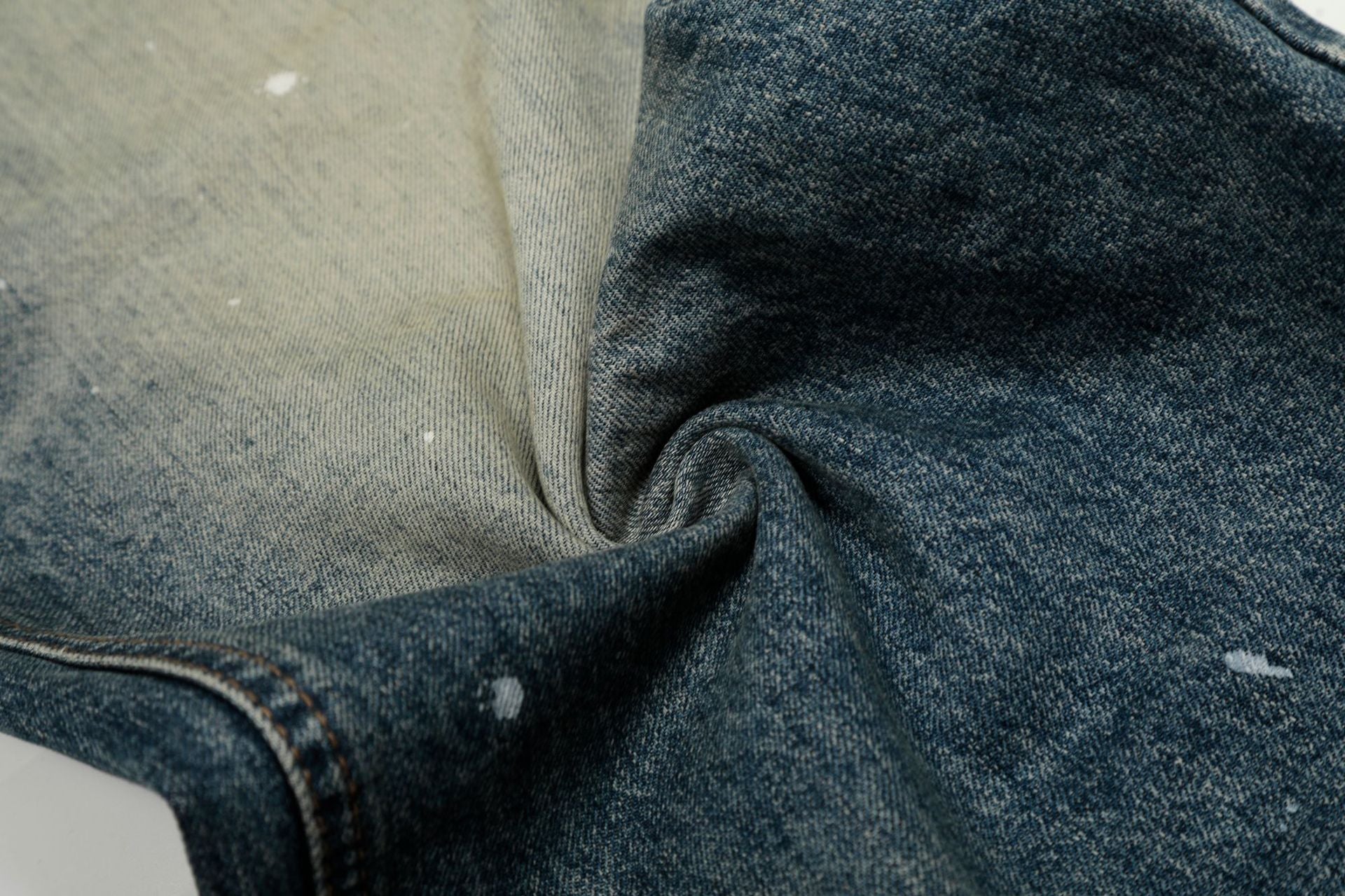Washed Whisker Paint Splatter Curved Denim Jeans