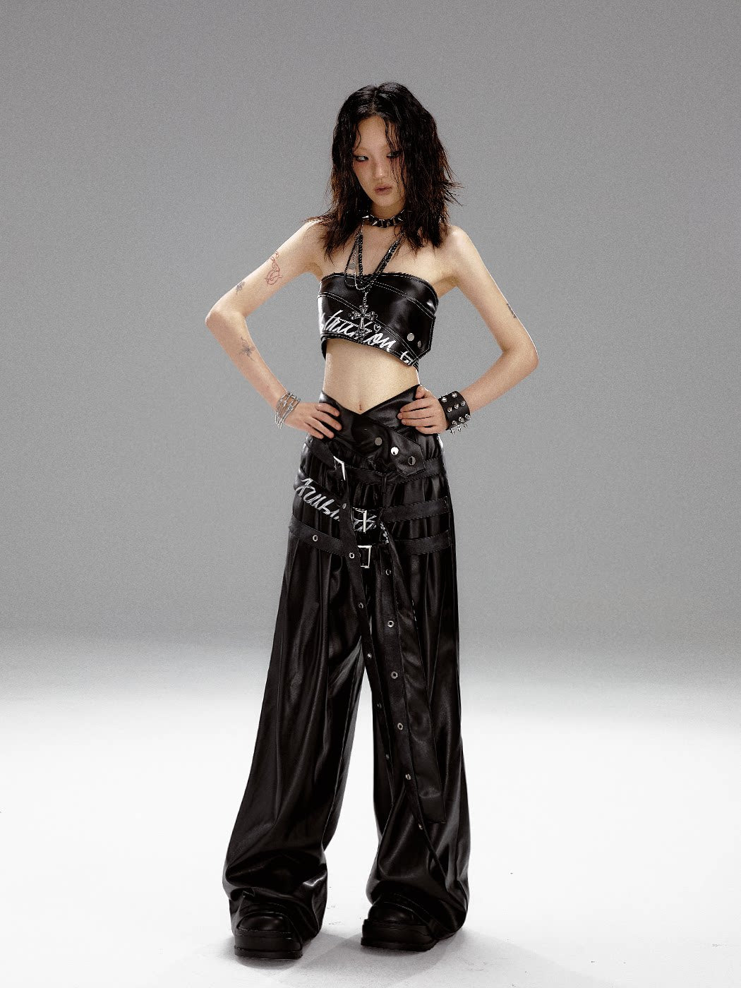 High-Waist V-Cut Graffiti Print Belted Black PU Leather Pants