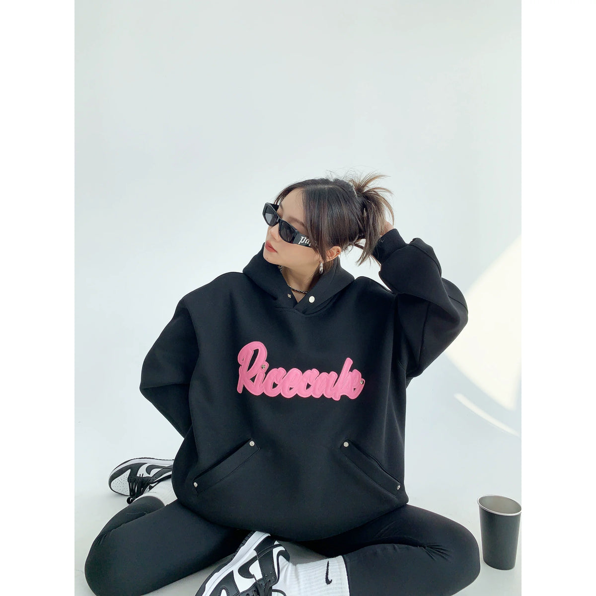Sudadera con capucha bordada de retazos de gran tamaño