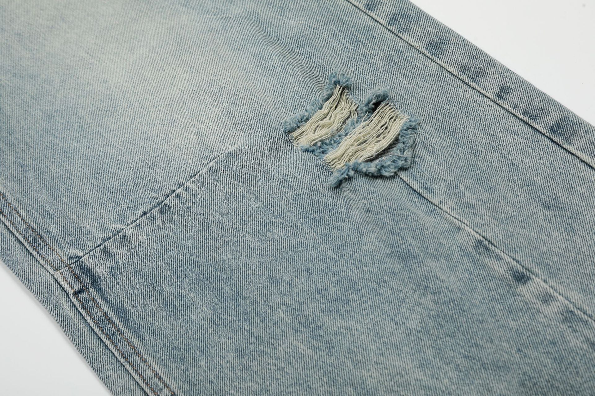 Wash Damage Wide Leg Curved Denim Jeans